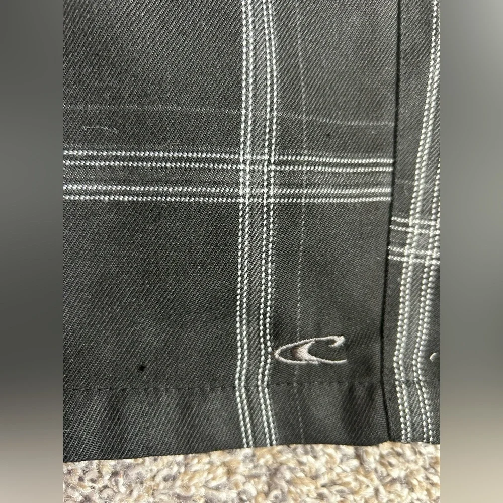 O’Neil Men’s Black with Gray and White plaid design size 34